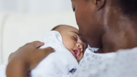 Getty Images Mother and baby