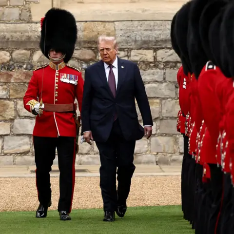 Reuters US President Donald Trump inspects the Guard of Honour  at Windsor Castle