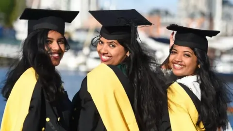 University of Suffolk Three of the quadruplets