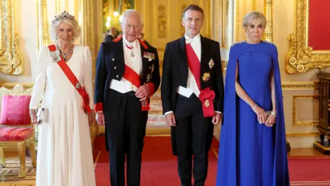 The Queen, the King, President Macron and his wife Brigette.