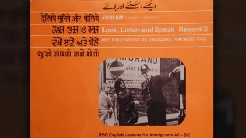 Krishna Devi / BBC A bright orange LP cover shows the title Look, Listen and Speak in Bengali, English, Gujarati, Hindi, Punjabi and Urdu. This is an English language television course produced by the BBC in the late 1960s, designed to help South Asian immigrants learn basic English, adapt to British culture, and integrate into life in the UK. In the centre of the cover is a black‑and‑white photo of a police officer talking to two people on a street.