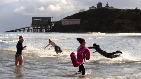 Reuters swimmers in sea