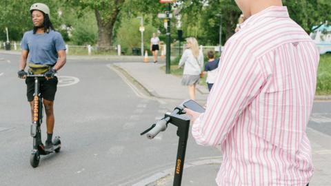 People with e-scooters