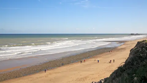 Getty A view of the beach looking towards Cromer at the North Norfolk seaside village of East Runton, Norfolk