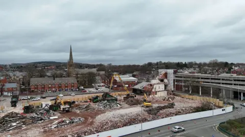 Mansfield Forward BID Drone shot of an urban building site where cranes are working to clear the site