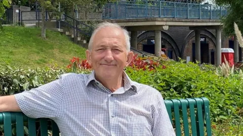 Melton Borough Council A man sitting on a bench in a park