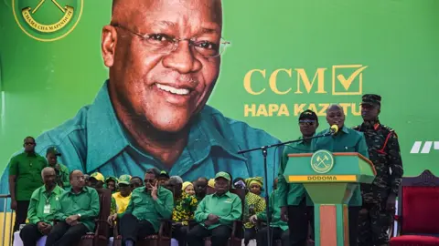 Getty Images John Magufuli (2nd R) speaks during the official launch of his party's campaign for the October general election at the Jamhuri stadium in Dodoma, Tanzania, on 29 August, 2020