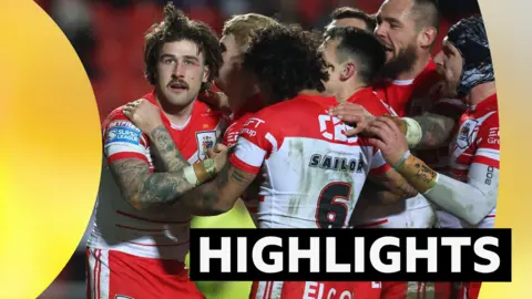 Joe Shorrocks of St Helens celebrates scoring their third try against Leigh