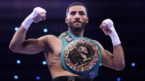 Galal Yafai with the interim WBC flyweight title over his shoulder