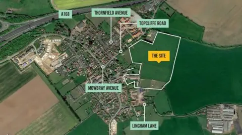 LDRS A map of a village, surrounded by fields, labelled with where a proposed housing development would be.