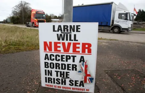 AFP A sign that reads: Larne will never accept a border in the Irish Sea - There is no union without NI