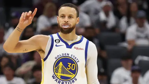Stephen Curry celebrates during Golden State Warriors' game seven win over Sacramento Kings