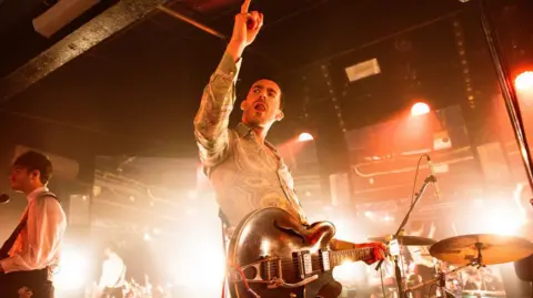 Myles Wright Miles Kane on stage