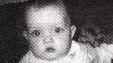 Family Handout Black and white photo of a baby looking at the camera