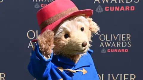 Getty Images Paddington Bear attends The Olivier Awards 2026, celebrating their 50th anniversary, at Royal Albert Hall on April 12, 2026 in London, England