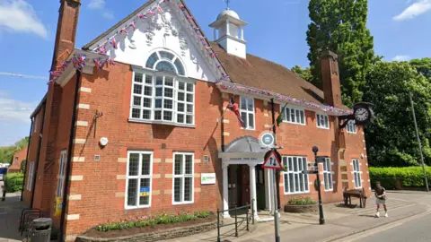 Google Farnham Town Council building which has union flag bunting
