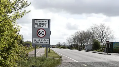 Getty Images A welcome to Northern Ireland road sign signalling the crossing of the border between north and south