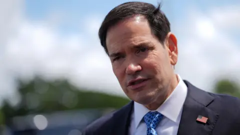 Rubio speaking to reporters before boarding his plane at Homestead Air Reserve Base, Thursday, May 21, 2026