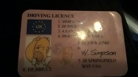 Thames Valley Police The driving licence with Homer Simpson's details on it