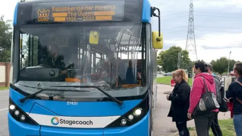 Jon Ironmonger/BBC People getting on a Stagecoach bus