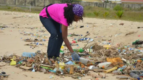 Ijeoma Ndukwe  Rubbish being collected on Elegushi beach