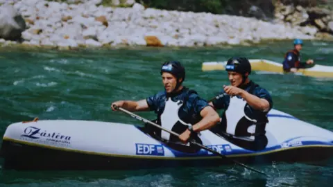 Remi Clermont Remi, at the front, kayaking