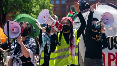 EPA-EFE/REX/Shutterstock Pro-Palestinian college students demonstrate at George Washington University