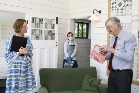 Matthew Horwood Mark Drakeford visiting a holiday home in the Vale of Glamorgan