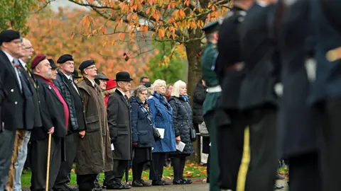 Matthew Horwood Ex-services personnel and civilians also took part in the national service