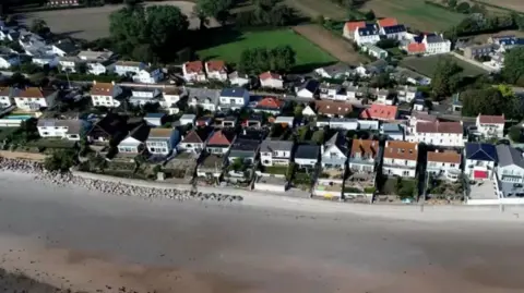 BBC An aerial view of houses in Jersey 