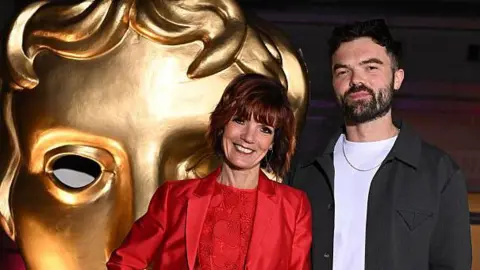 Getty Images Diane Carson and son Ross Carson from series two of The Traitors pictured at the Bafta nominees party in April