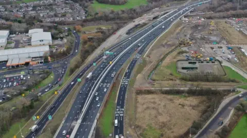 National Highways A drone shot of the Western bypass with the new Allerdene Bridge in the distance and construction work to the right.