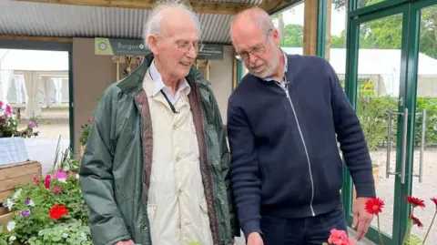 BBC Michael Lawson and Mark Rogan in a garden centre