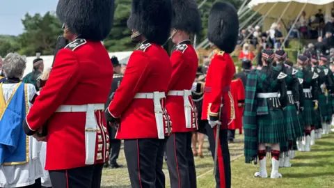 The guard of honour and the band lining the ceremonial walkway.
