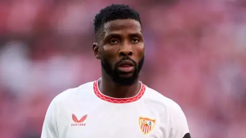 Sevilla's Kelechi Iheanacho in the Spanish club's white kit