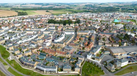 Getty Images An aerial view of the village of Poundbury, on the outskirts of Dorchester in Dorset. It is part of the Duchy of Cornwall, which passed to William when he succeeded his father as Prince of Wales when Charles became King. 