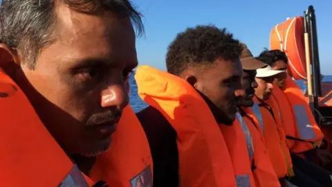 AFP Migrants rescued from a ship and taken to the Ocean Viking