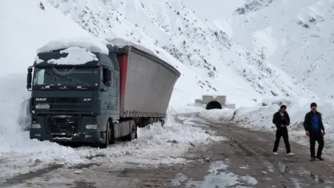 Getty Images Lorry buckling under weight of snow
