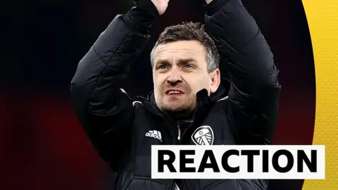 Michael Skubala celebrates Leeds' 2-2 draw at Old Trafford