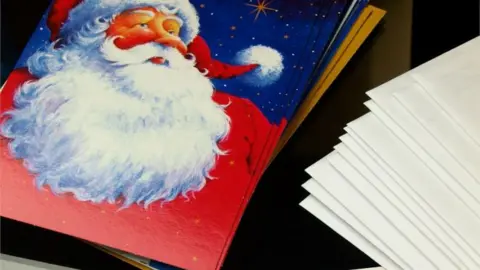 Getty Images A pile of Christmas cards