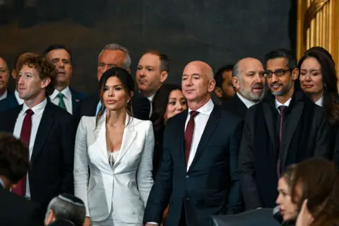 Getty Images CEO of Meta Mark Zuckerberg, Lauren Sanchez, US businessman Jeff Bezos and CEO of Alphabet Inc and Google Sundar Pichai attend the inauguration ceremony where Donald Trump will sworn in as the 47th US President in the US Capitol Rotunda in Washington, DC, on January 20, 2025