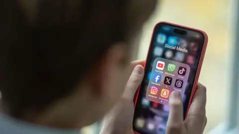 Getty Images A child on a smartphone 