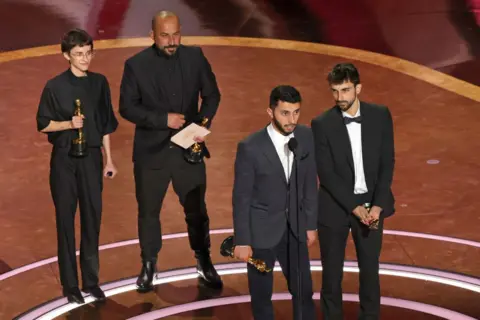 Makers of No Other Land take the stage at the Academy Awards 