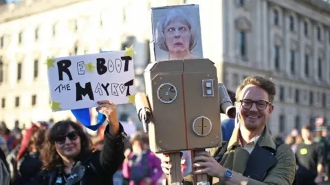 PA Anti-Brexit campaigners take part in the People"s Vote march