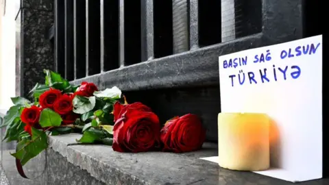 Getty Images At the Turkish embassy in Moscow, flowers are laid