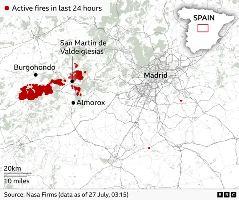 A map of Spain, showing Madrid and to the left of Madrid areas of red showing active fires.