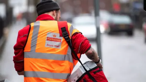 Getty Images Postal worker in Wales