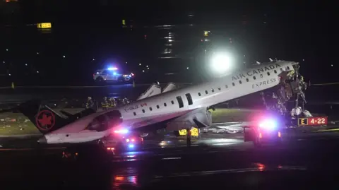 Getty Images A damaged Air Canada plane
