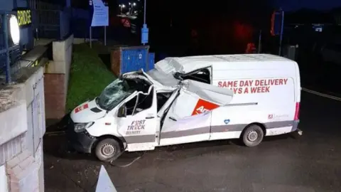 A crashed delivery van