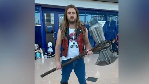 Supplied Rev Simpson dressed as Thor 